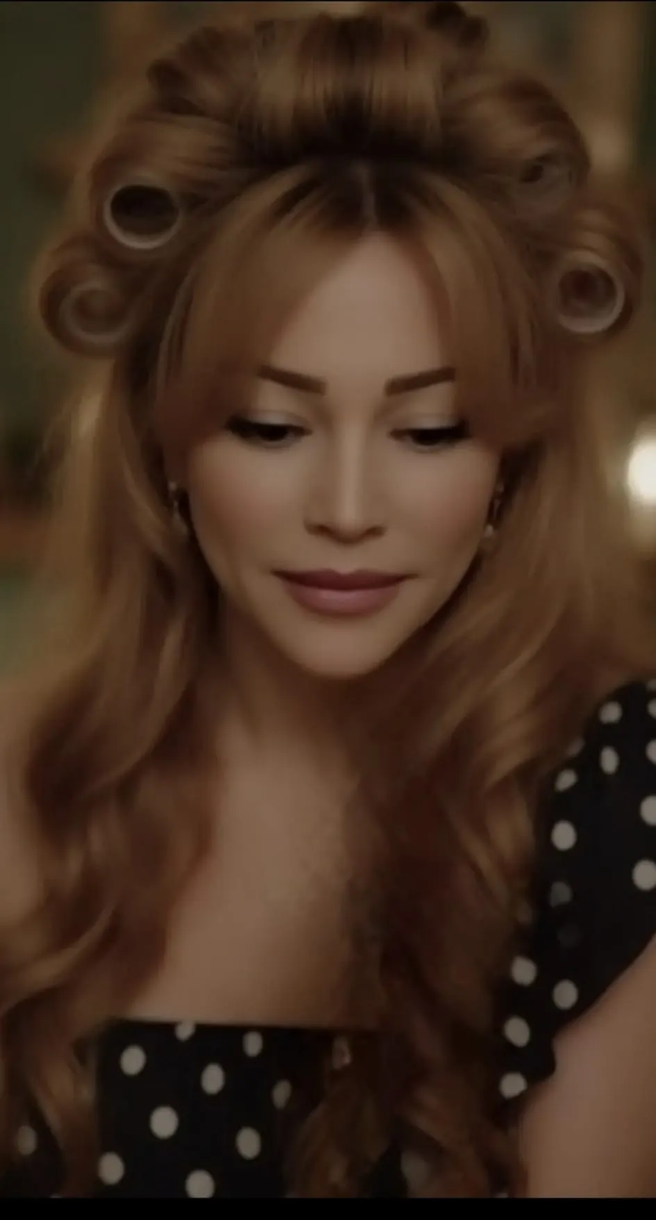 Gloria May Byron with her hair in curlers